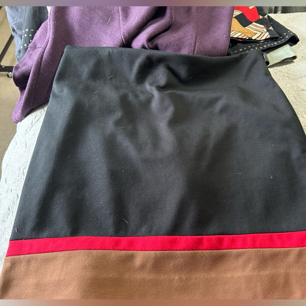 Black with red and brown accent skirt